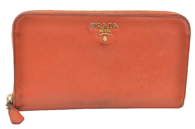 Prada tote bags with a printed Prada logo on the front for brand visibilityAuthentic PRADA Saffiano Leather Round Zip Long Wallet Purse Orange K5346