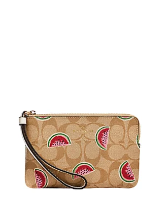 Coach bags with a front - zip pocket for small items like keys and cardsCoach Corner Zip Wristlet in Signature With Watermelon Print