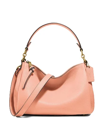 Coach Dempsey bags with a contrast - colored interior for visual interestCoach Shay Crossbody