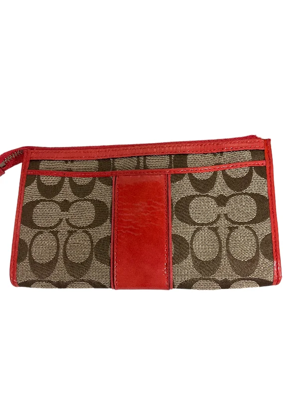 Coach handbags with a perforated leather detail for a breathable and unique designWristlet Designer By Coach  Size: Medium