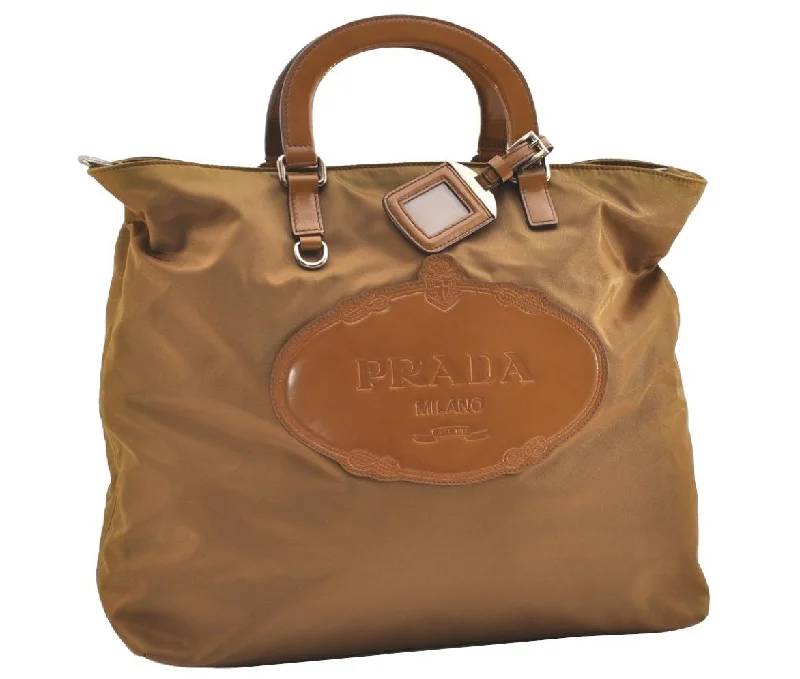 Prada Cahier bags with a monogram - embossed leather surfaceAuthentic PRADA Vintage Nylon Tessuto Leather 2Way Shoulder Tote Bag Brown 3441J