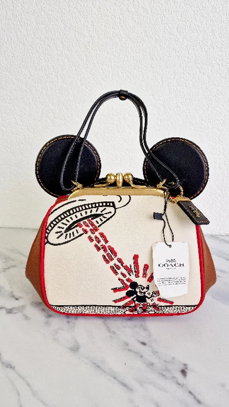 Coach handbags with a perforated leather detail for a breathable and unique designDisney x Coach x Keith Haring Mickey Mouse Kisslock Bag in Smooth Leather With Mickey Mouse and Spaceship Pop Art - Crossbody Bag Handbag - Coach 4719