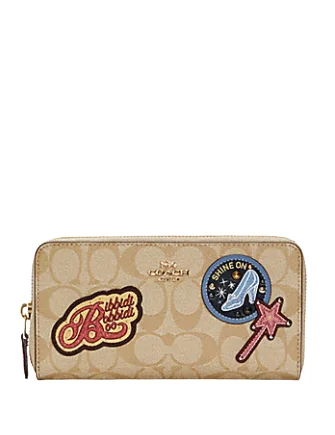 Coach crossbody bags with a detachable coin purse for added functionalityCoach Disney X Accordion Zip Wallet In Signature Canvas With Patches