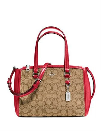 Coach bags with a zip - top closure and a front - pocket for quick accessCoach Stanton Carryall 26 in Signature Jacquard