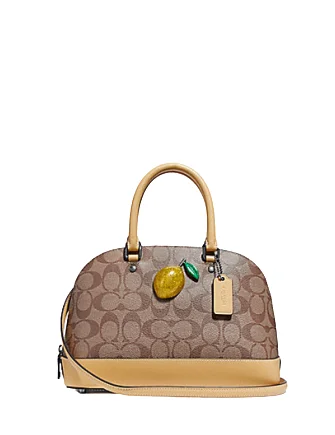 Ladies Coach Tabby bags with a textured leather surface for a more tactile lookCoach Mini Sierra Satchel in Signature Canvas with Lemon