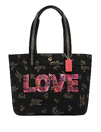 Coach Rogue bags with a monogram - embossed leather surfaceCoach Tote With Jason Naylor Love Graphic