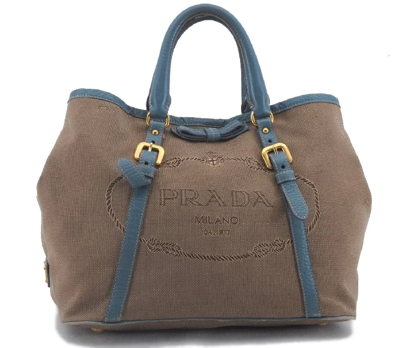 Prada bags with a snap - button closure and a decorative charm for a fashionable lookAuthentic PRADA Canvas Leather Logo Jacquard Hand Bag Brown Blue 4065D