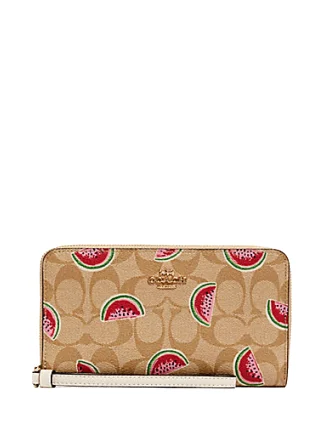 Ladies Coach Borough bags in a pastel shade for a soft and delicate appearanceCoach Large Phone Wallet in Signature Canvas With Watermelon Print