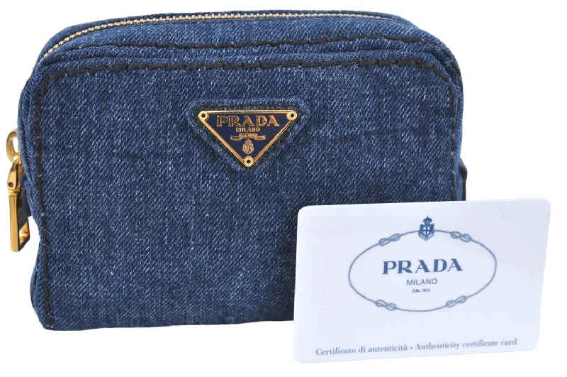 Prada Cahier bags with a monogram - embossed leather surfaceAuthentic PRADA Denim Leather Pouch Purse 1N0340 Blue J2610