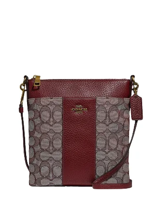 Coach tote bags with a double - handle and shoulder - strap option for easy useCoach Signature Jacquard Kitt