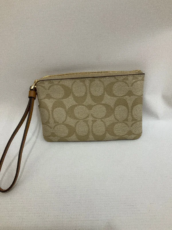 Coach bags with a back - zip pocket for storing valuables securelyWristlet Designer By Coach  Size: Small