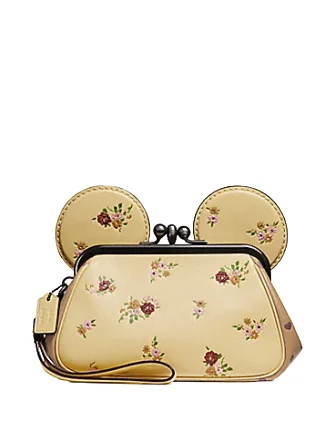 Coach crossbody bags with a keychain holder for practicalityCoach Kisslock Wristlet With Floral Mix and Minnie Mouse Ears