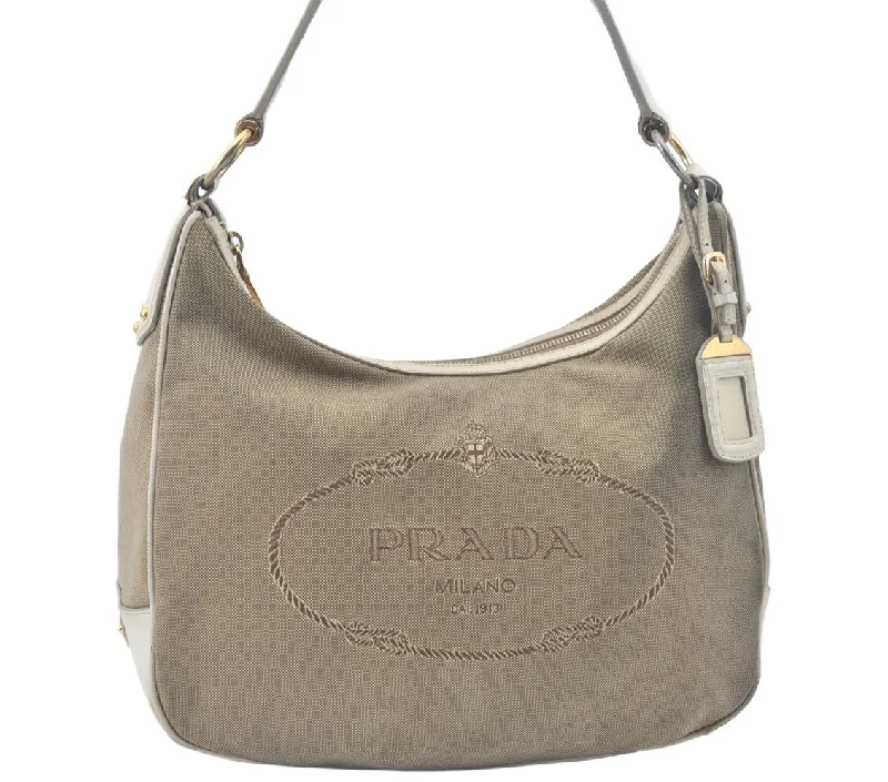 Ladies Prada Galleria bags with a textured leather surface for a more tactile lookAuthentic PRADA Canvas Shoulder Bag Leather Beige L0213