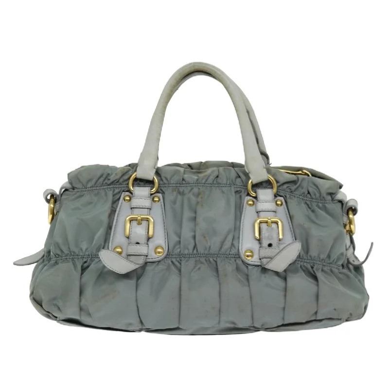 Prada Re - Edizione 2005 bags with a retro - inspired designPRADA Hand Bag Nylon 2way Green  74635