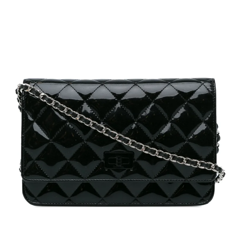 Chanel bags with gold, silver, and pearl accentsBlack Chanel Quilted Patent Reissue 2.55 Wallet on Chain Crossbody Bag