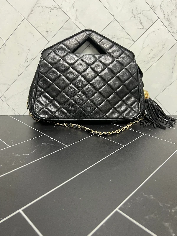 Chanel bags available at online luxury retaileRARE Chanel Black Quilted Lambskin Chain Sling