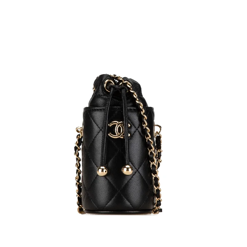 Chanel bags for women who love timeless fashionBlack Chanel Micro CC Quilted Calfskin Drawstring Bucket Bag