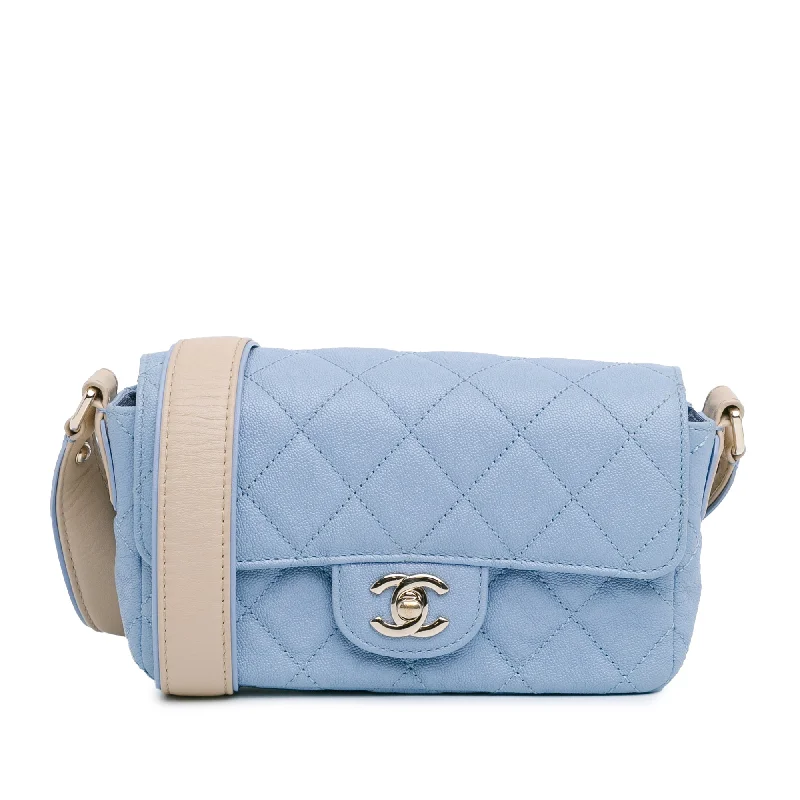 Chanel bags with modern touchesBlue Chanel CC Quilted Caviar Single Flap Crossbody Bag