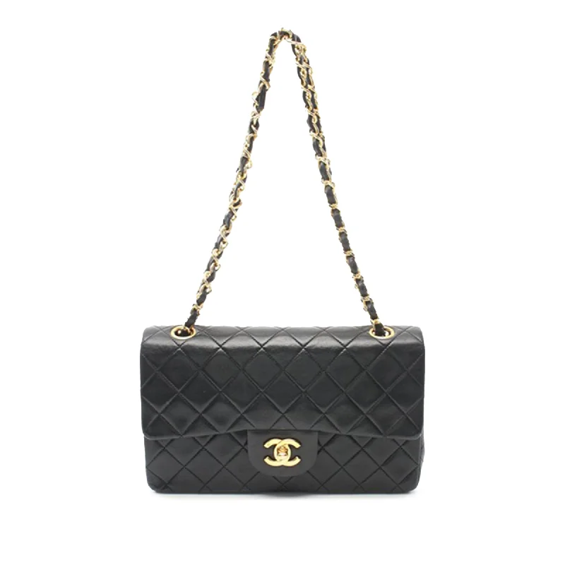 Chanel bags with iconic stitching detailsBlack Chanel Small Classic Lambskin Double Flap Shoulder Bag