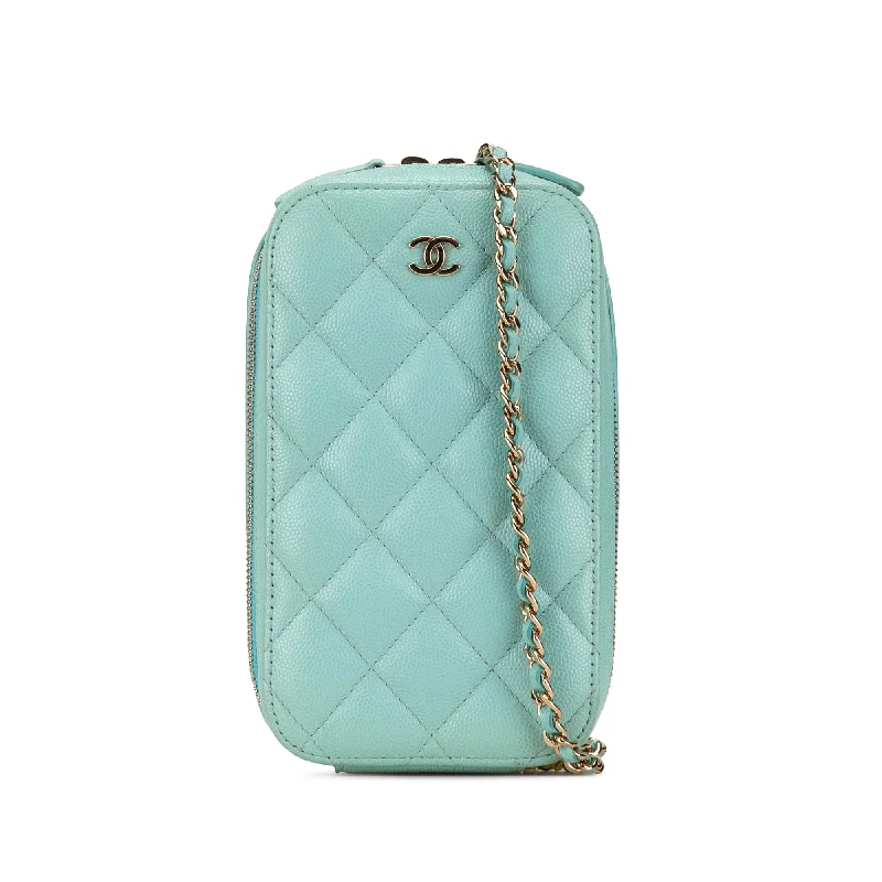 Chanel bags with iconic stitching detailsBlue Chanel CC Quilted Caviar Zip Phone Case Crossbody Bag