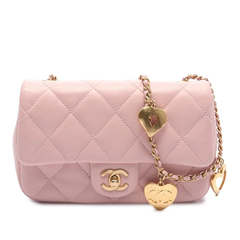 Chanel bags with chain and leather strap combinationsPink Chanel Mini Quilted Lambskin Heart Charms Flap Crossbody Bag