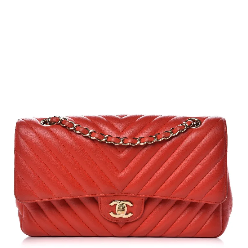 Chanel bags in luxury boutiques worldwideCHANEL Lambskin Chevron Quilted Medium Double Flap