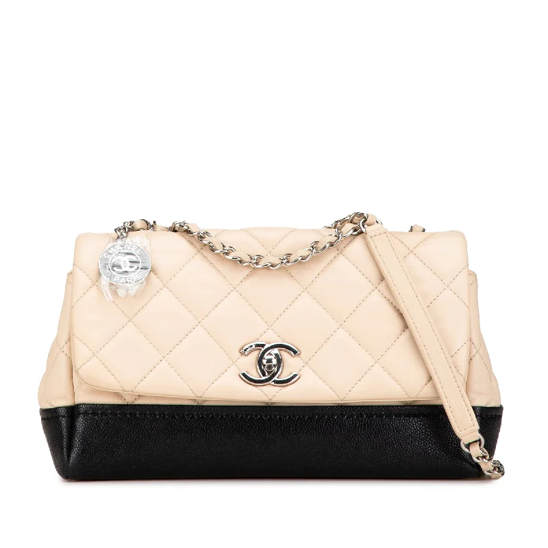 Chanel bags with exclusive seasonal releasesBeige Chanel CC Bicolor Quilted Lambskin Flap Crossbody