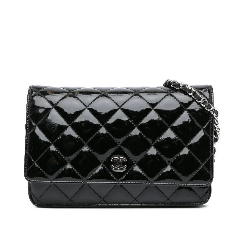 Chanel bags available at online luxury retaileBlack Chanel CC Quilted Patent Wallet On Chain Crossbody Bag