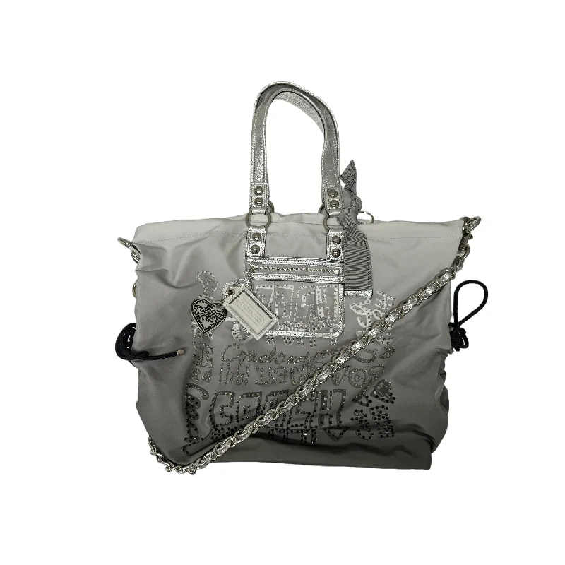 Coach Dempsey bags with a contrast - colored interior for visual interestHandbag Designer By Coach  Size: Large